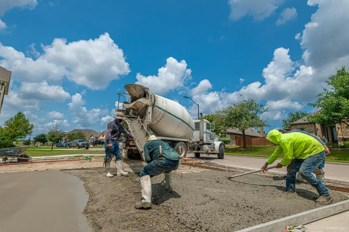 Pouring a new concrete driveway from the mixer truck